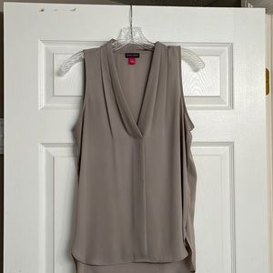 Vince Camuto silky feeling sleeveless tank. Polyester and washable!